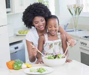Mother and child eating together